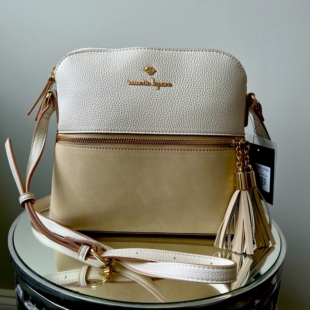 NWT Nanette Lepore dome crossbody bag. This bag is great for any occasion.